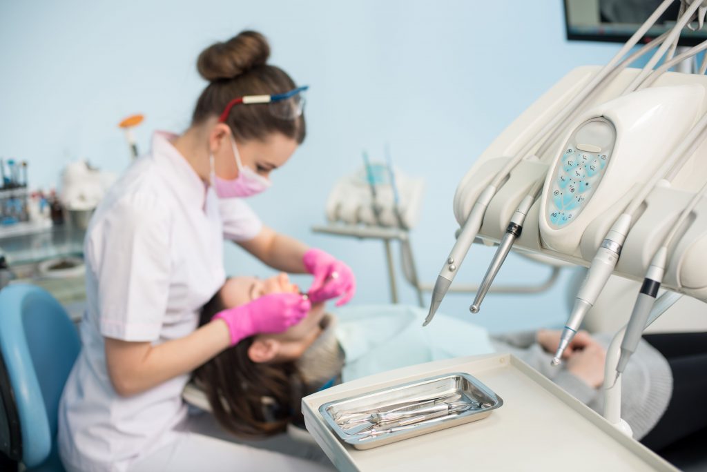 patient receiving multiple dental implants